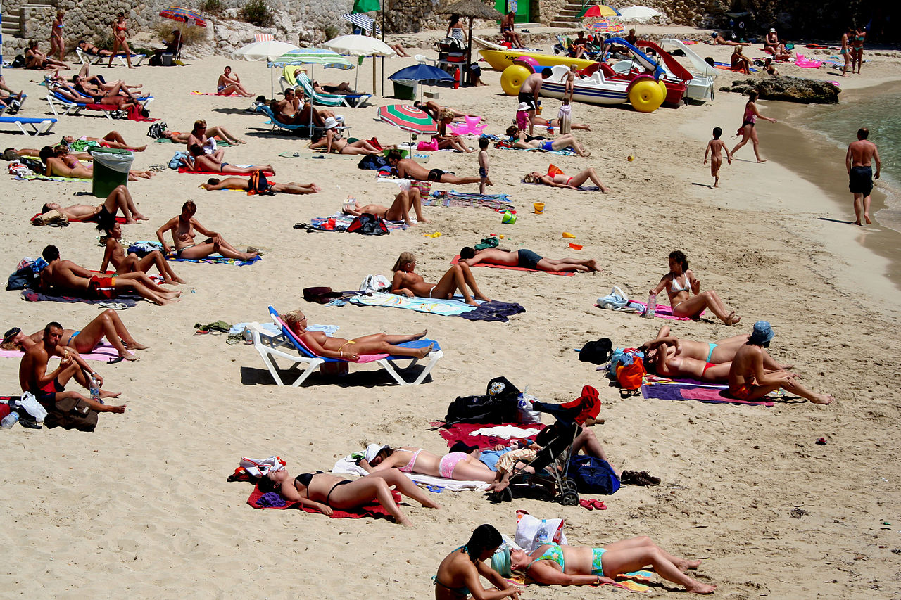 booth scates add naked at a beach photo