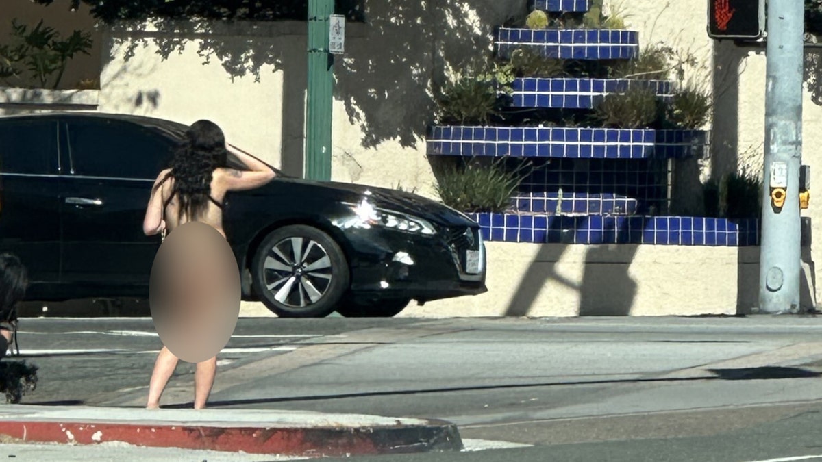 nearly naked prostitutes prowl streets