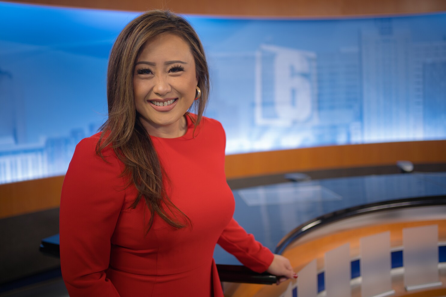 christine guy add newscaster strip photo