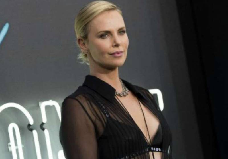 christopher calub share charlize theron boobies photos