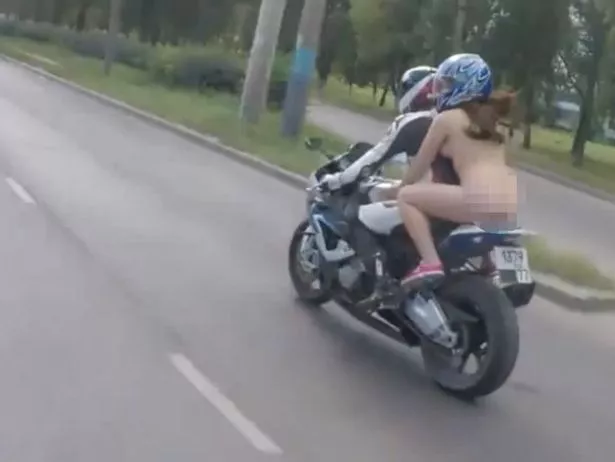 naked woman on a motorcycle